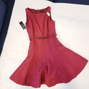 Belted dress with wide skirt